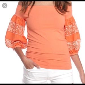 Free People “rock with it” off the shoulder top.